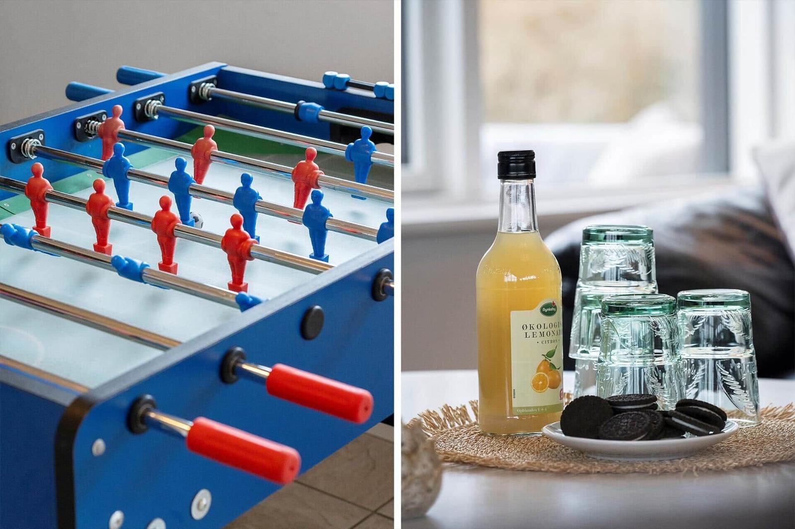 Fussballtisch und Getränke mit Keksen auf Tisch