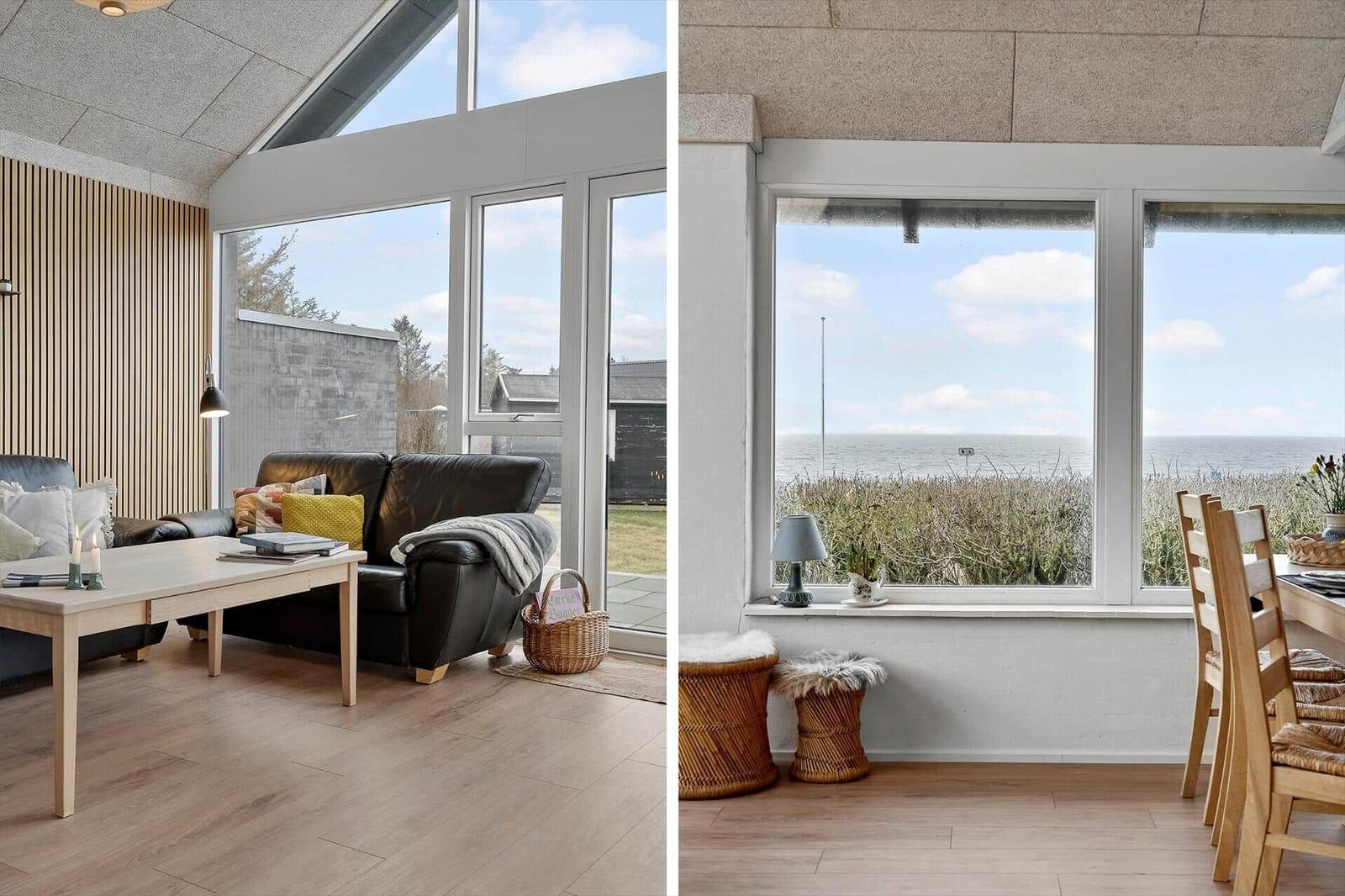 Wohnzimmer mit Sitzgelegenheit und Blick aufs Meer. Essbereich mit Fensterblick auf die Küste.