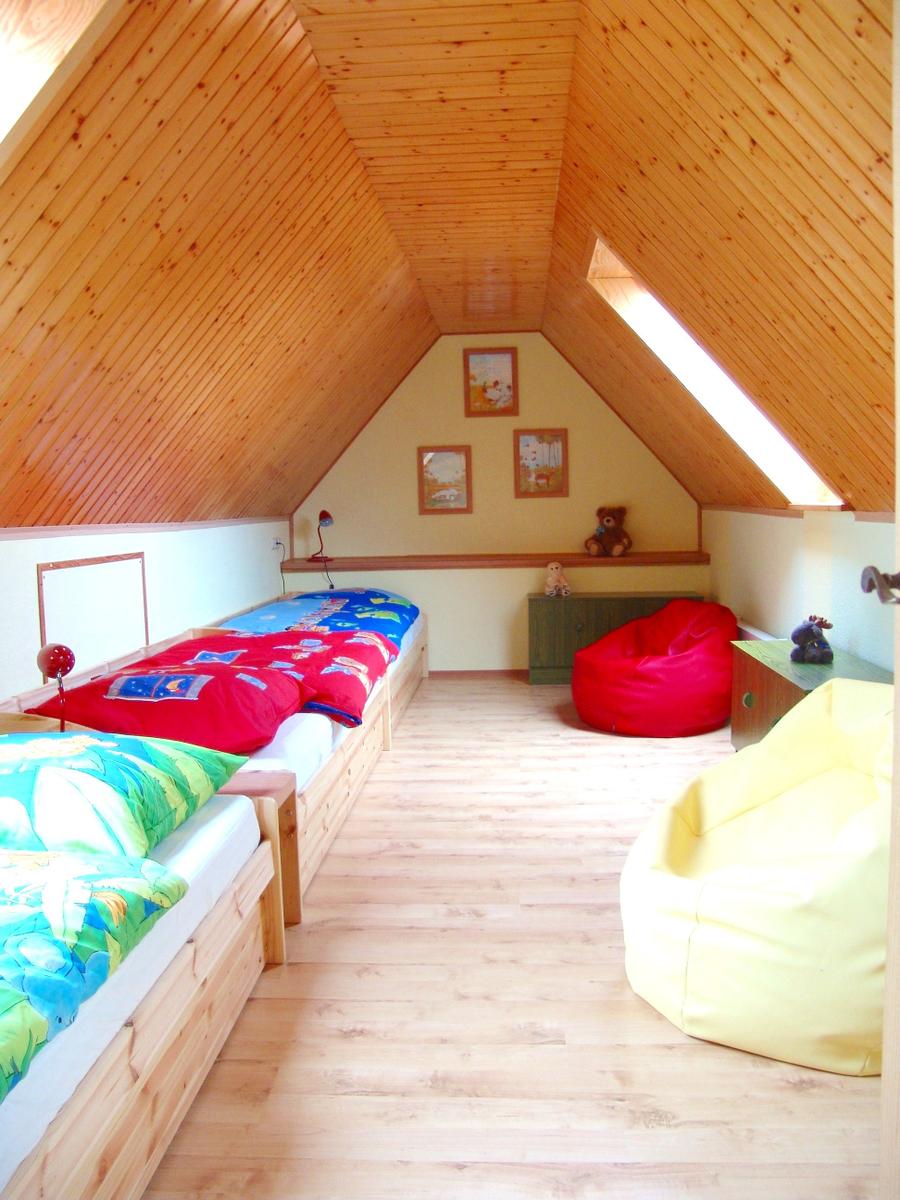Das Schlafzimmer mit drei Betten