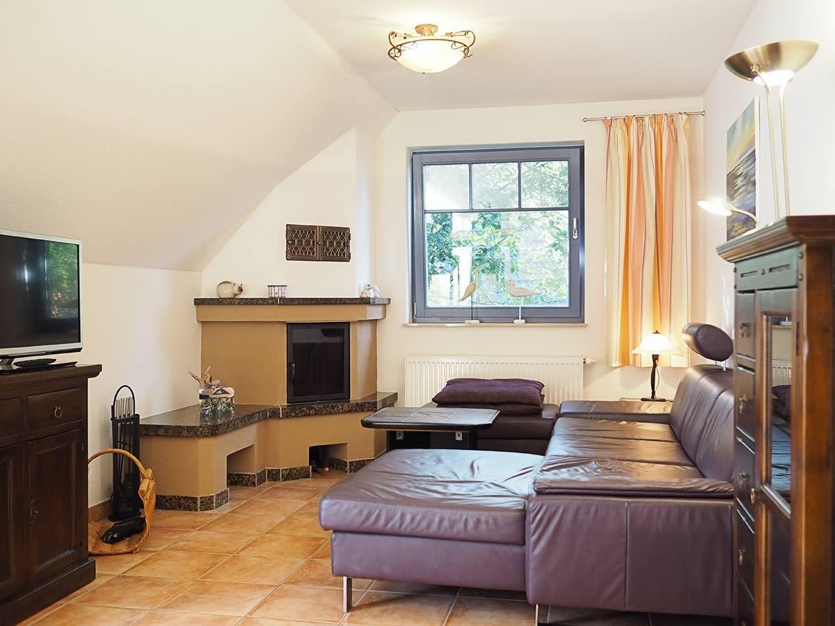 Wohnzimmer mit Kamin