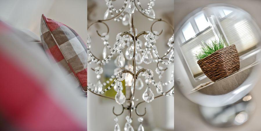 Kissen mit kariertem Stoff, Kristallleuchter und Pflanze in Korb