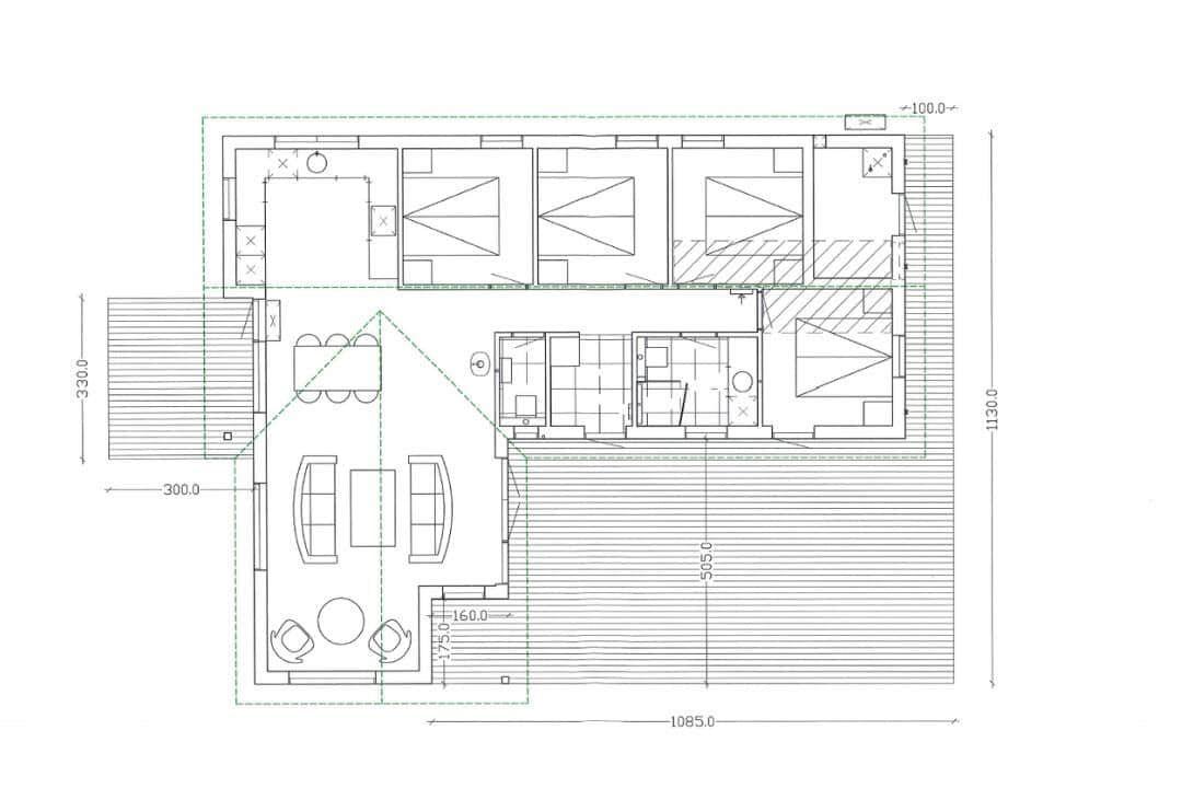 Floor plan showing living, sleeping areas, kitchen, and bathroom.