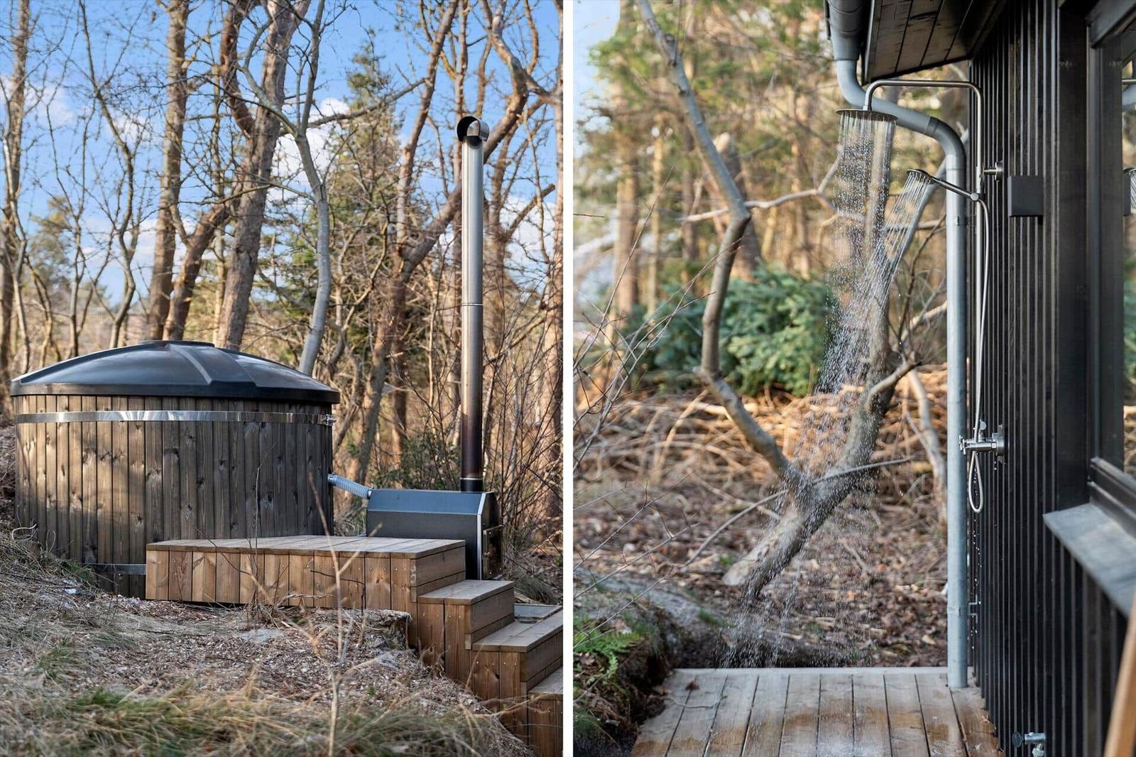 Cabin with wooden deck, outdoor hot tub, and shower in the woods.