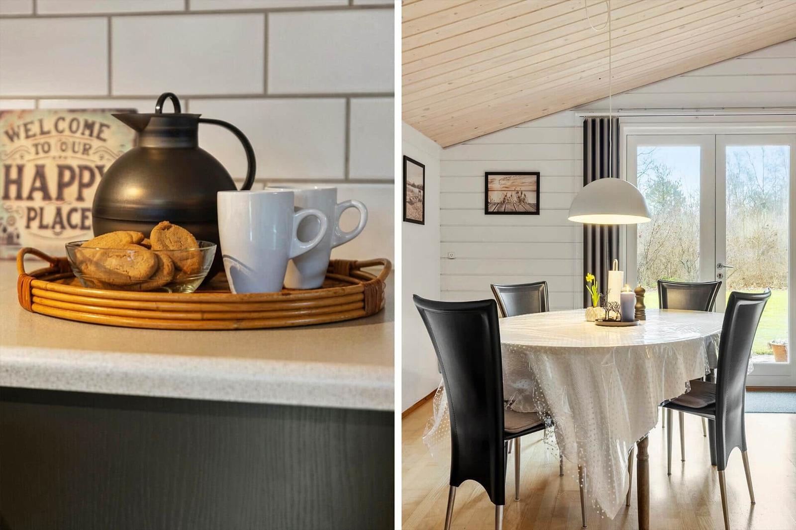 Küche mit Kaffeekanne und Keksen. Esszimmer mit Tisch, Stühlen und Fenster.