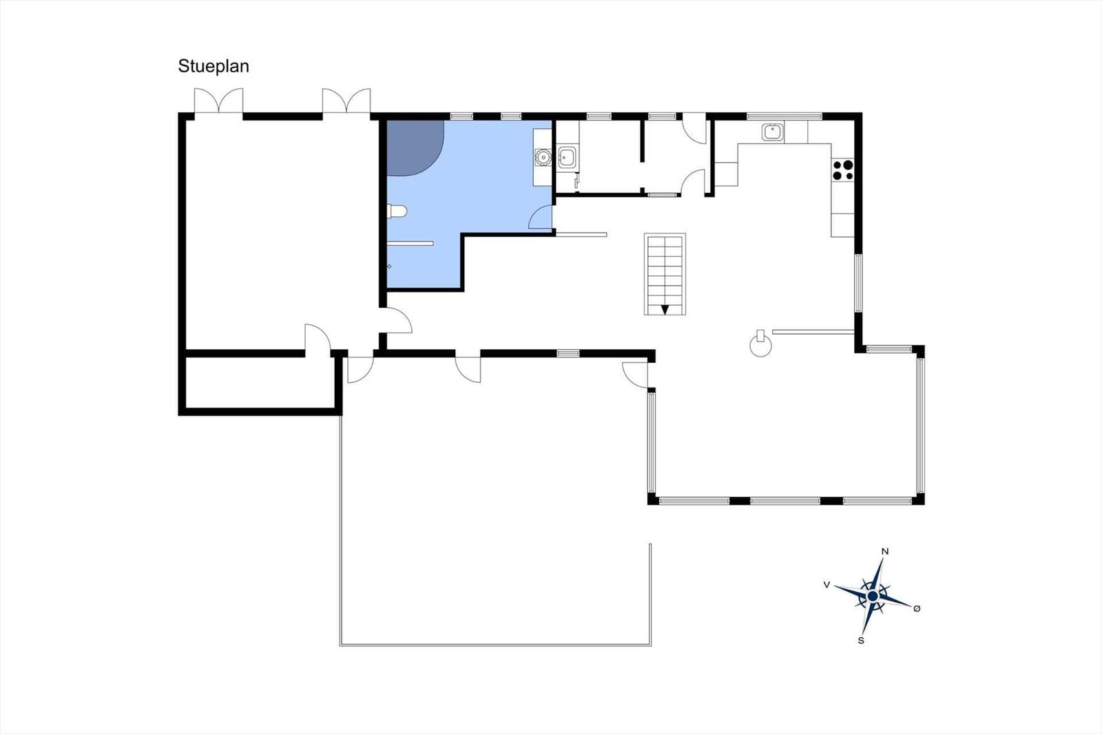 Floor plan shows living area, kitchen, and bathroom with compass