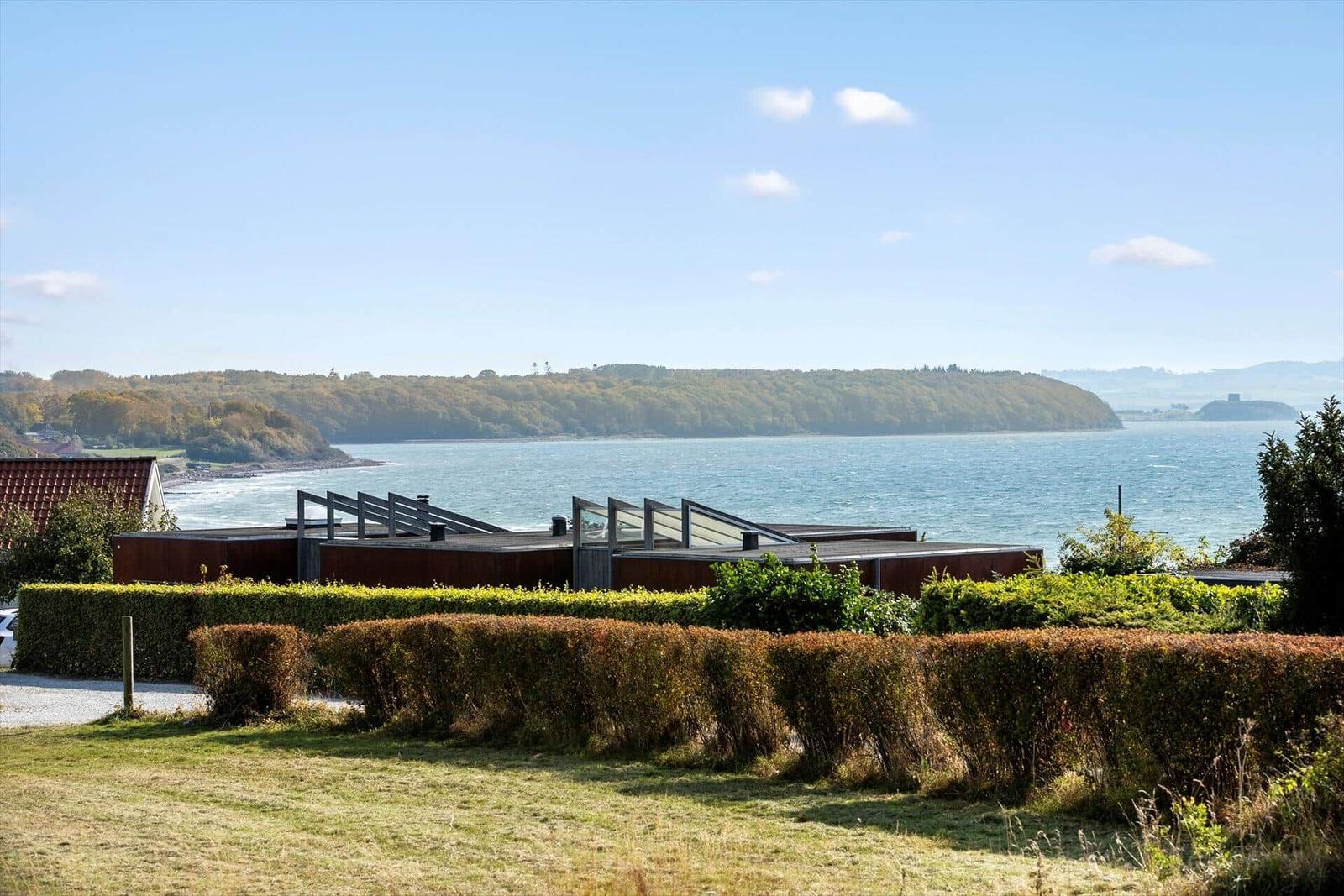 Modern villa with sea view and green hills