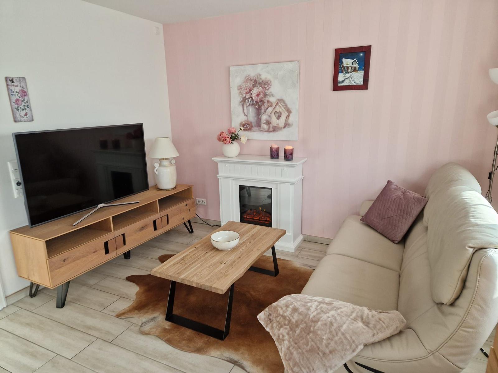 Wohnzimmer mit Elektrokamin