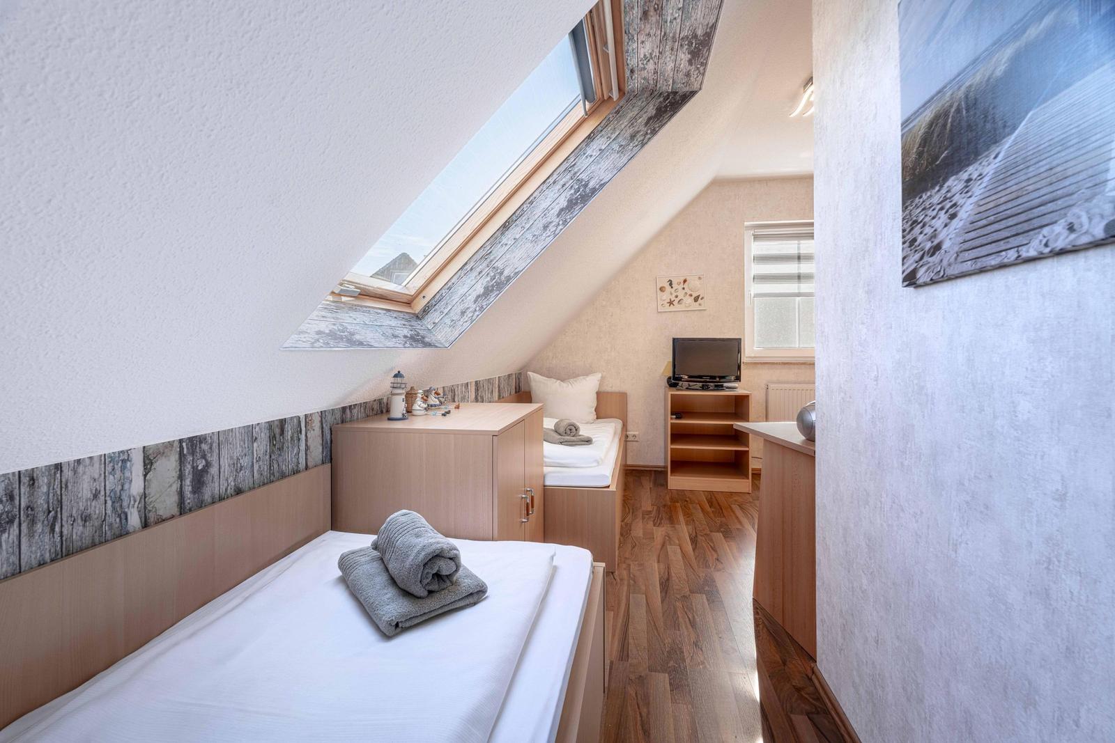 Schlafzimmer mit Einzelbetten