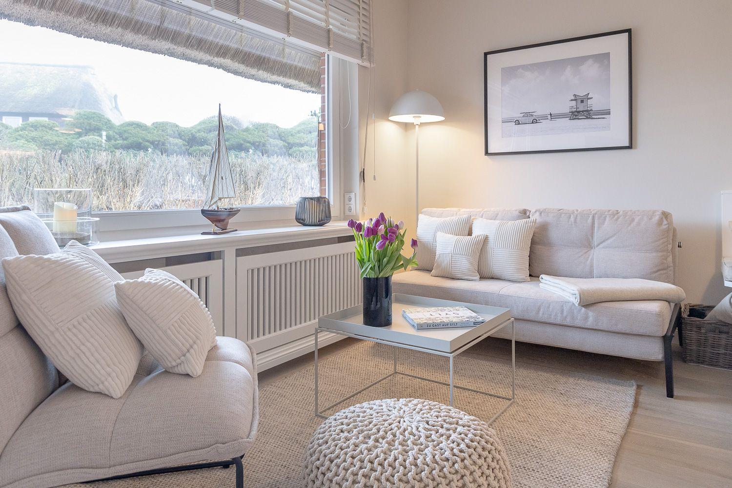 Wohnzimmer mit direkten Zugang zur Terrasse