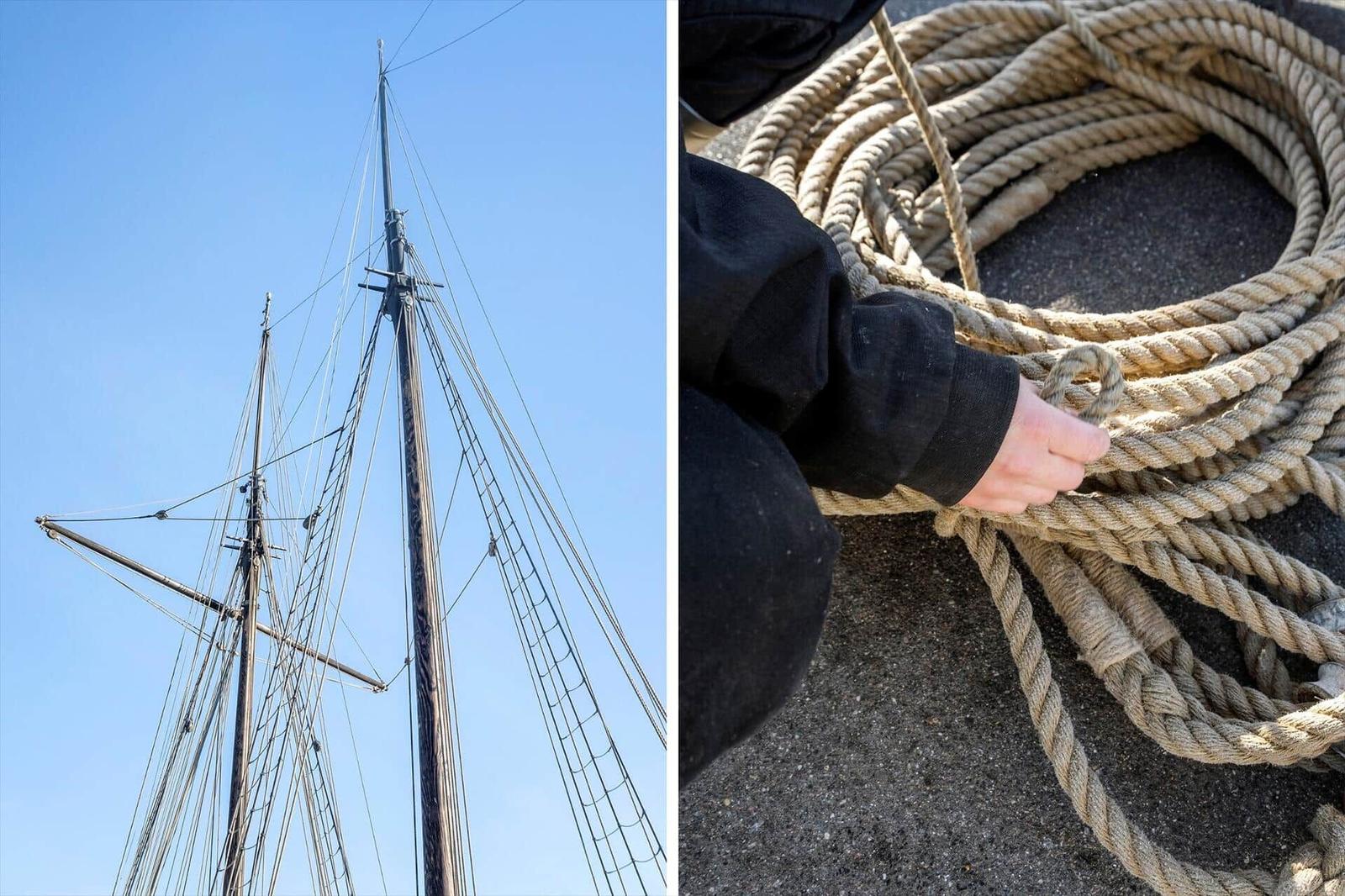 Segelschiff mit Masten und Tauwerk. Hand fasst grobe Seile.