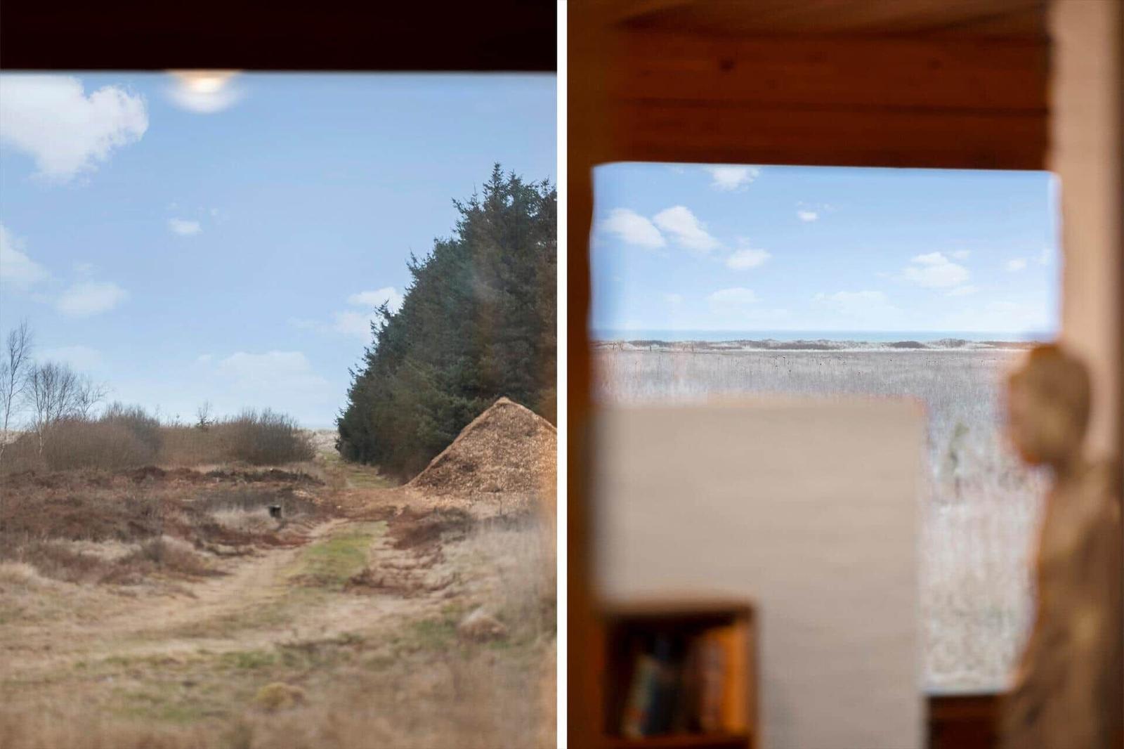 Durch Fensterblick auf Wald und Strand