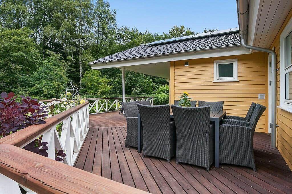Deck with seating area and view into the forest