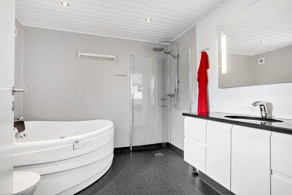 Bathroom with shower, bathtub, and sink