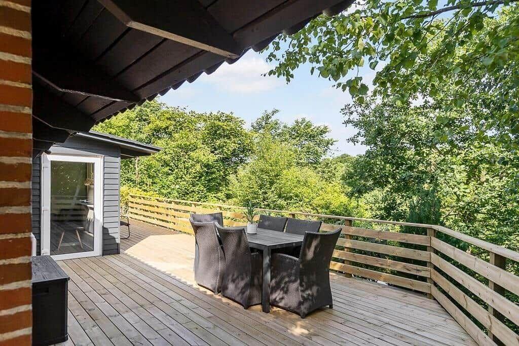 Deck with seating and view into the forest