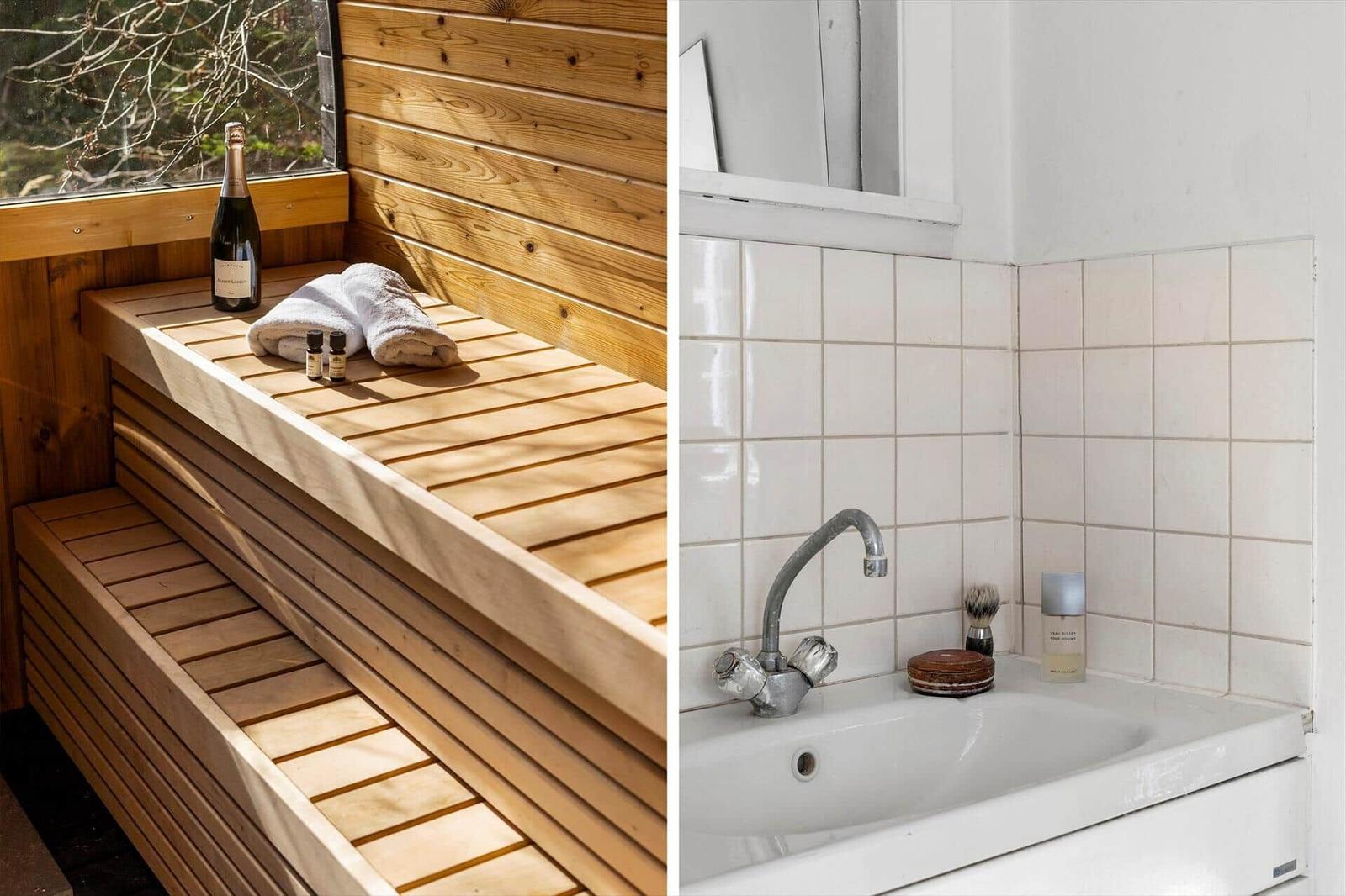 Sauna with wooden bench and bottle. Bathroom with white tiled wall and sink.