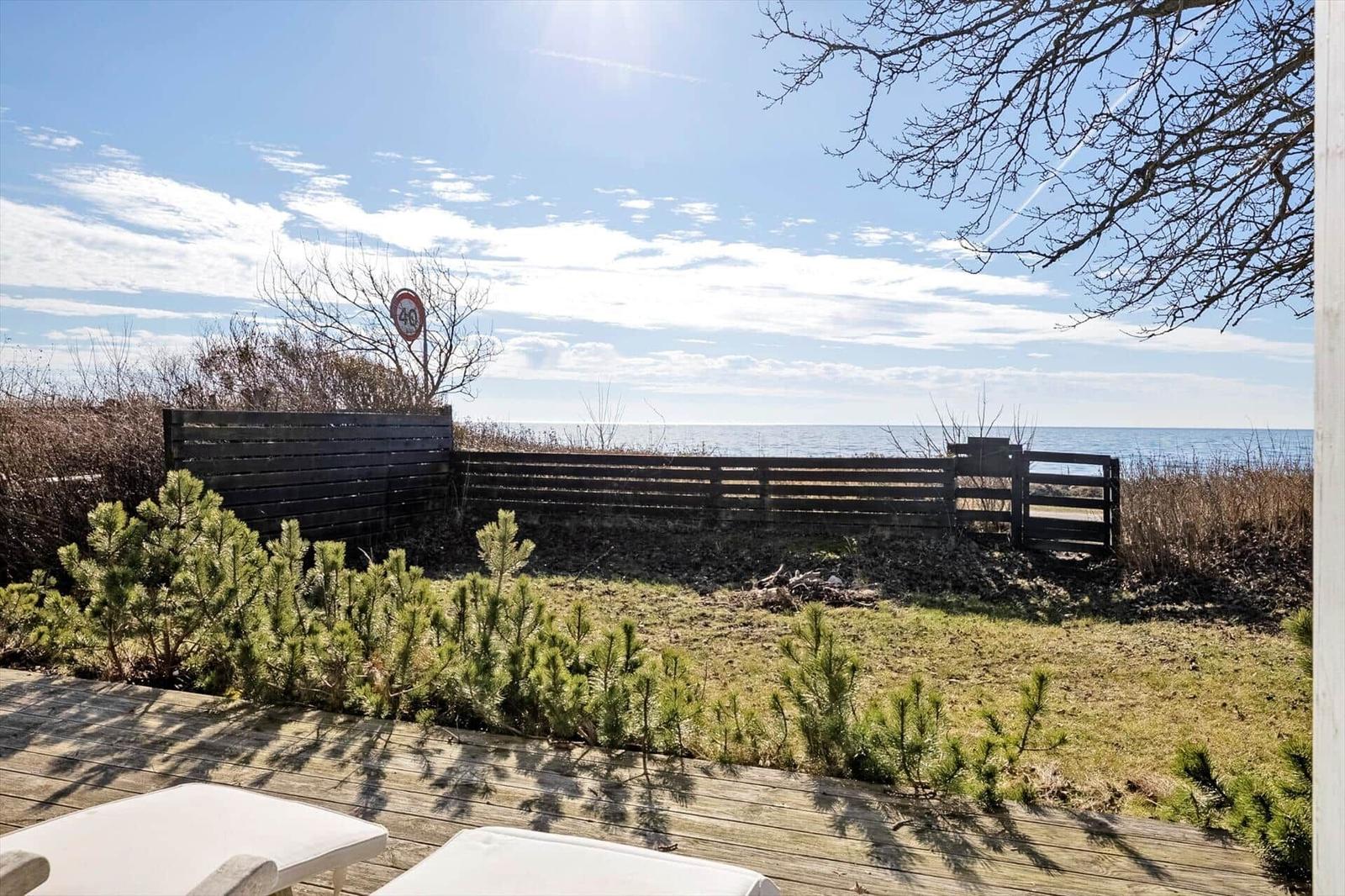 Deck with lounge chairs and sea view