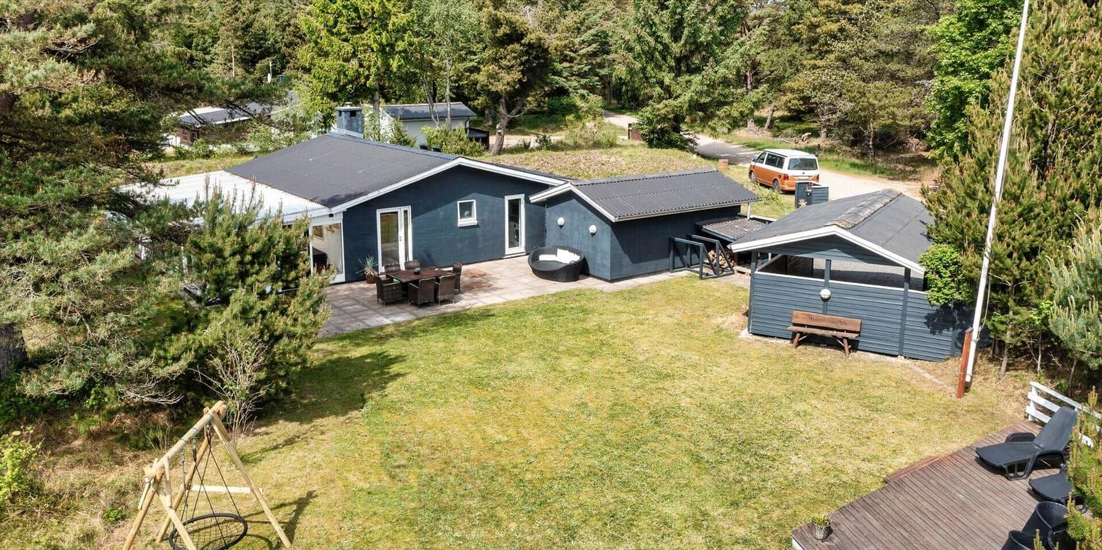 Moderne Ferienhaus mit Terrasse, Garten und Grillplatz im Wald