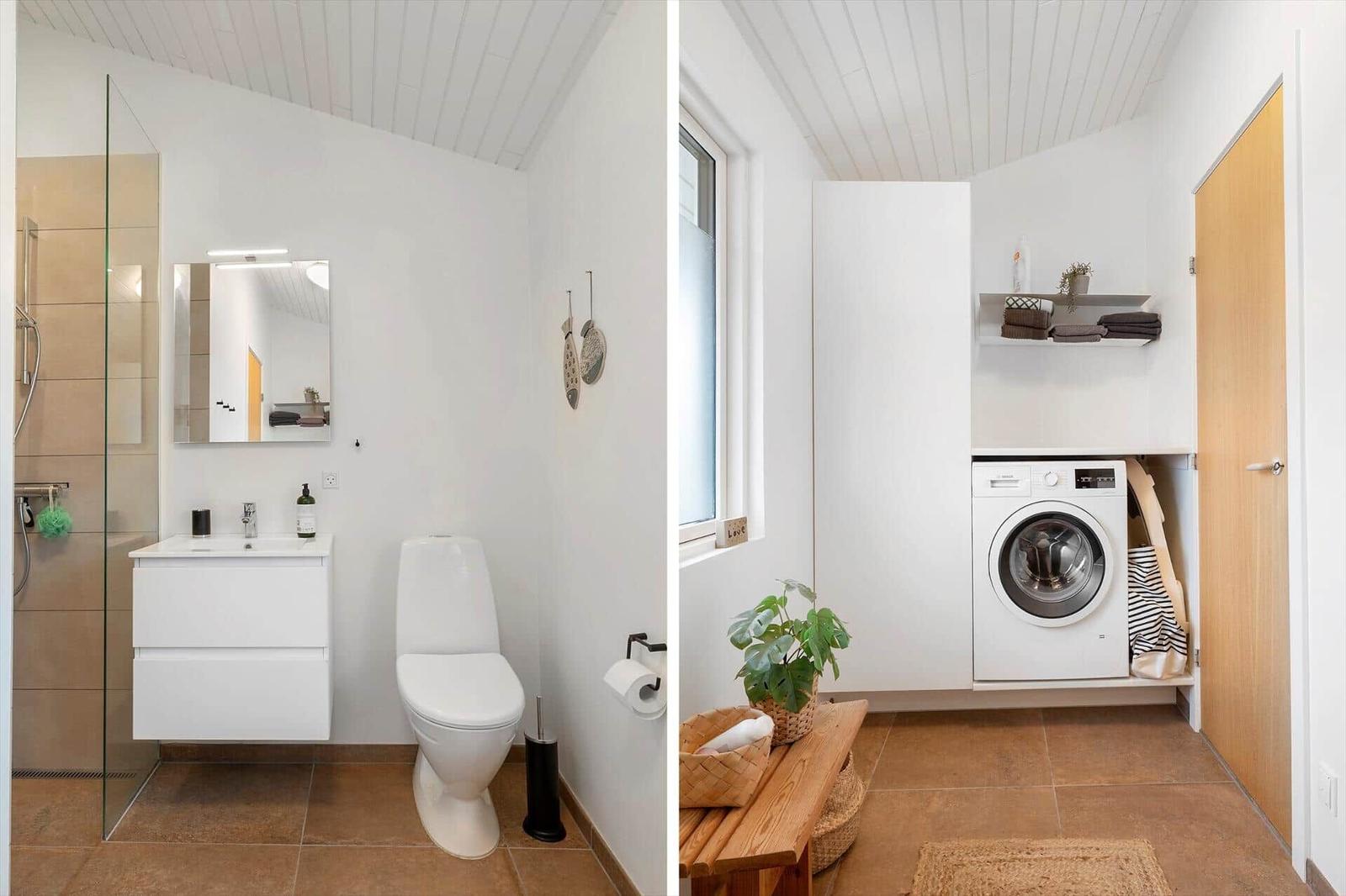 Badezimmer mit Dusche und Waschbecken. Nebenraum mit Waschmaschine und Pflanze.