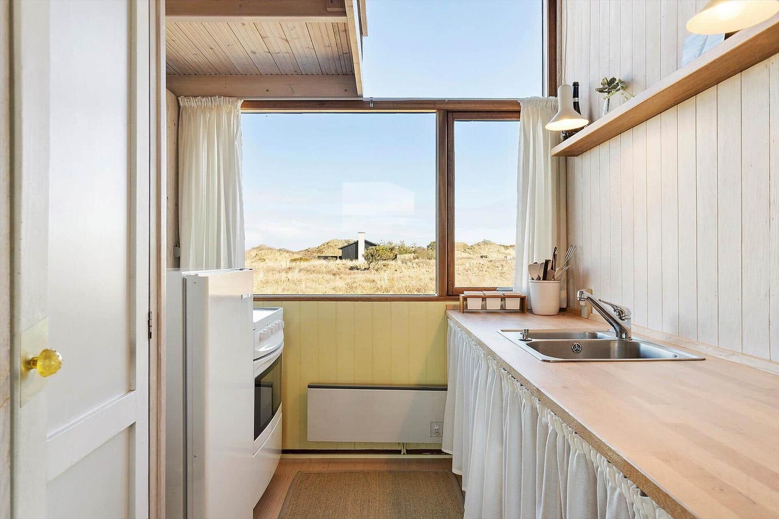 Kitchen with view of dune landscape