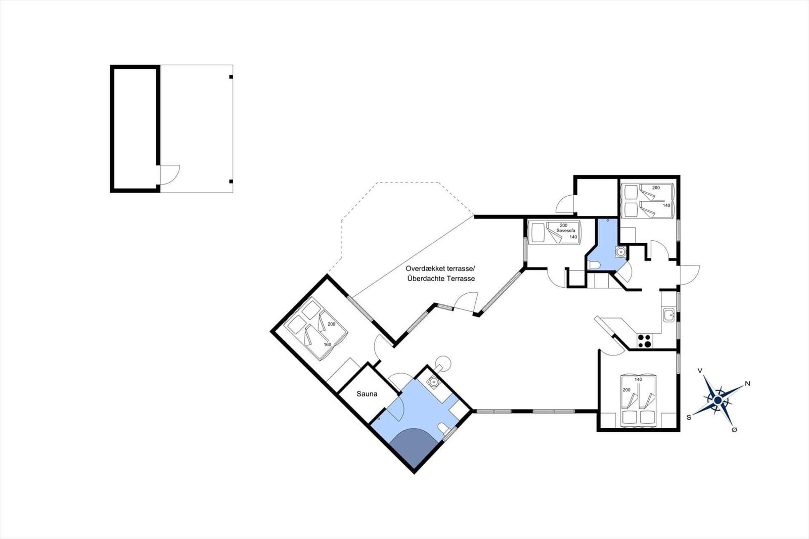 Dieses Ferienhaus hat drei Schlafzimmer, eine Sauna und eine überdachte Terrasse.