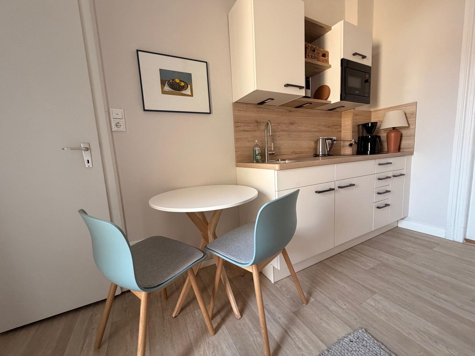 Küchenzeile mit Sitzplatz...