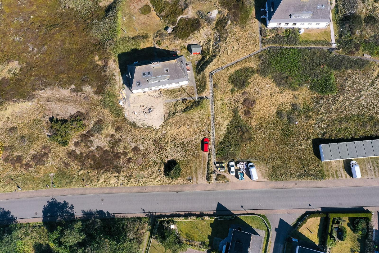 House with garage and parking on green property