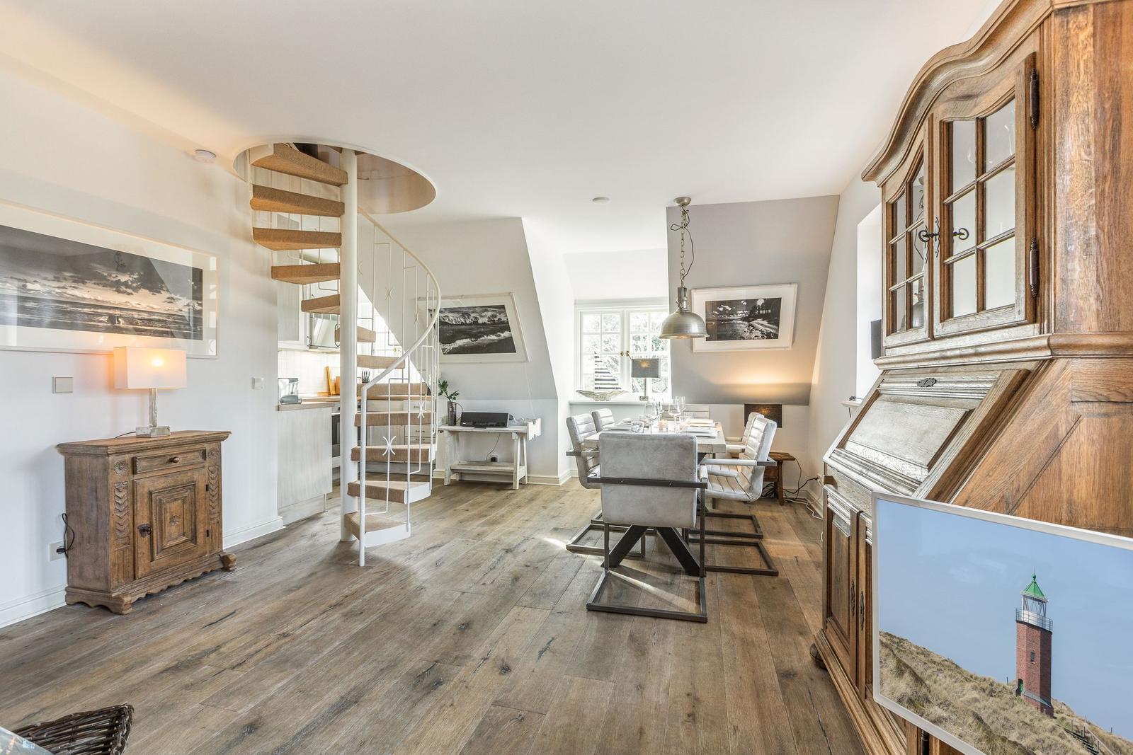 House with dining area, staircase, and hardwood floor