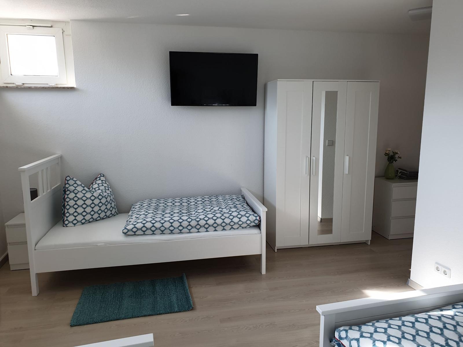 Schlafzimmer 1 mit 3 Einzelbetten...