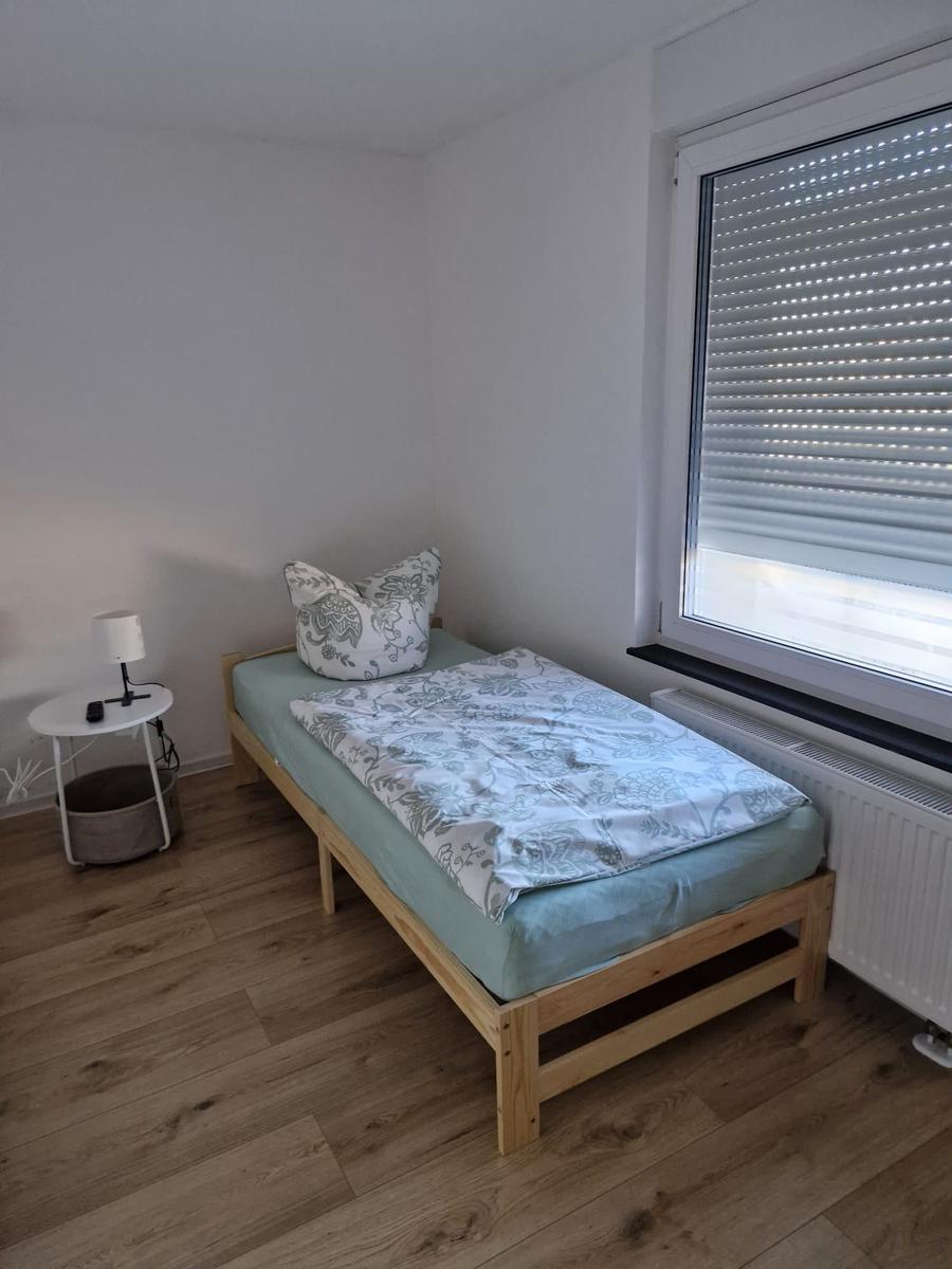 Schlafzimmer 3 mit einem Einzelbett...