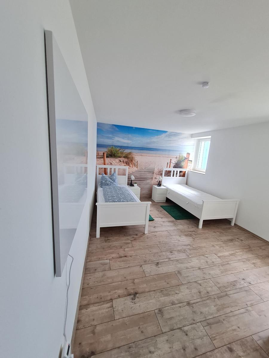 Schlafzimmer 1 mit 2 Einzelbetten im EG...