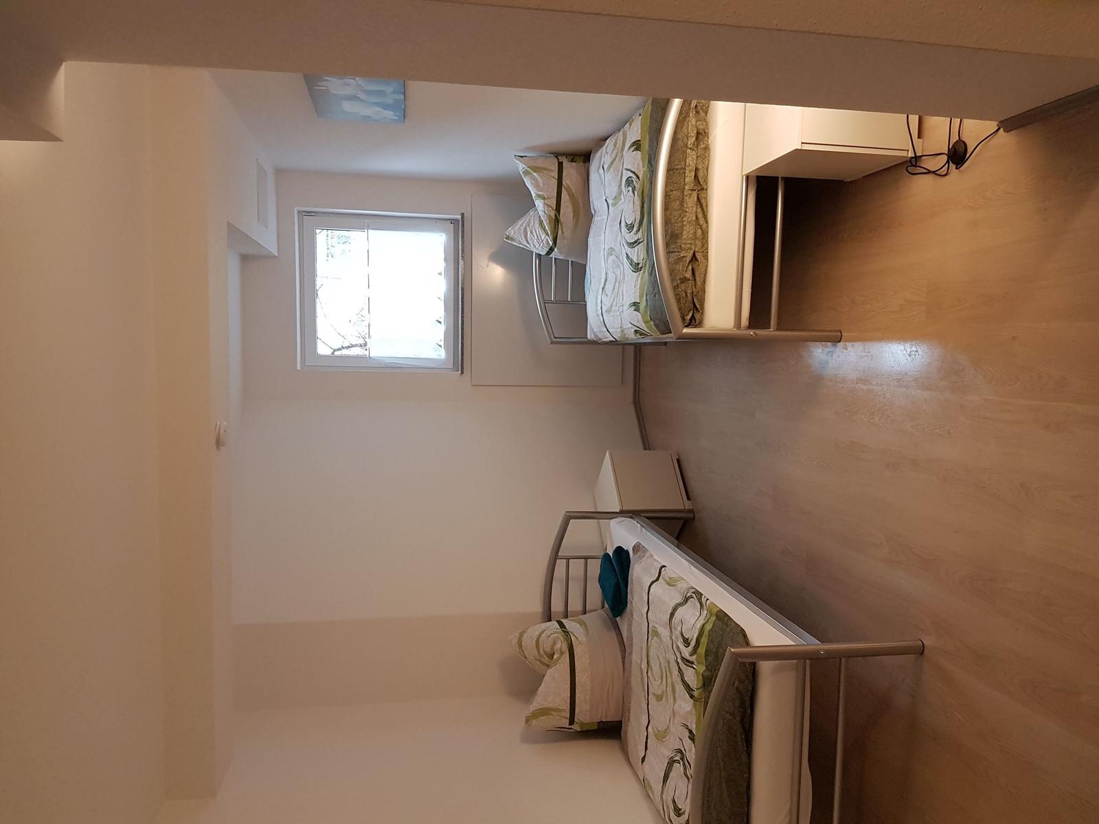 Schlafzimmer 3 mit 3 Einzelbetten...