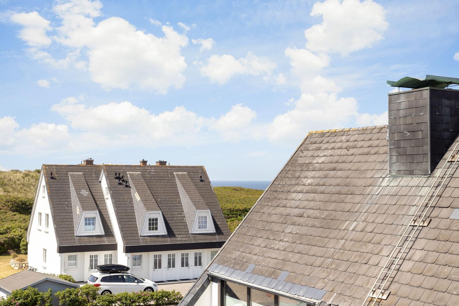 Attic with dormer windows and sea view.