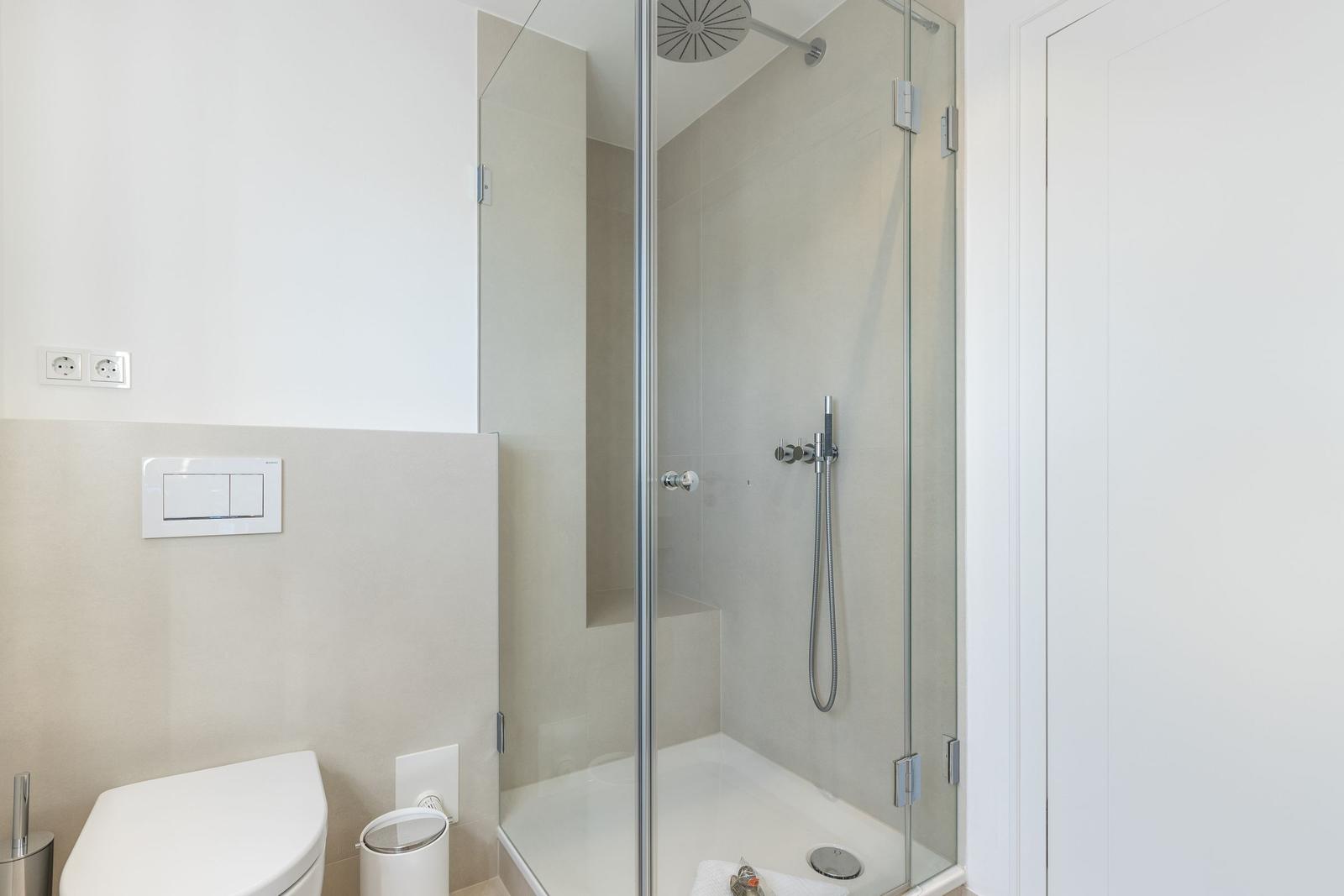 Bathroom with shower and toilet.