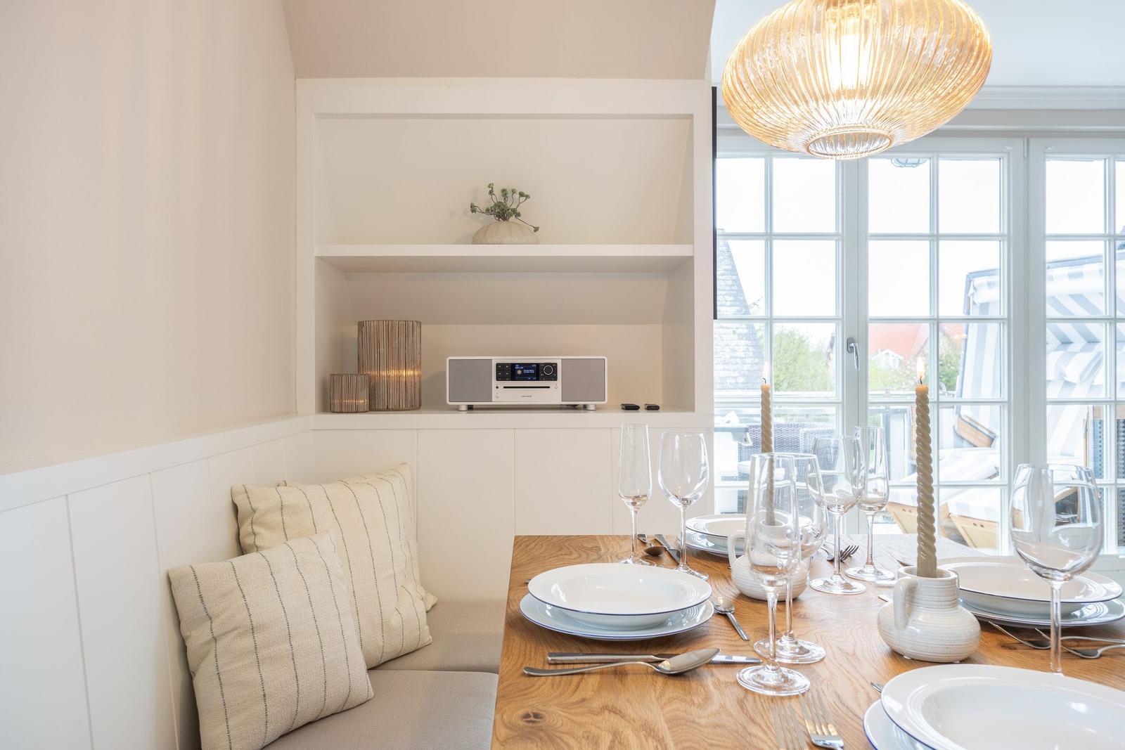 Dining table with chairs and window view