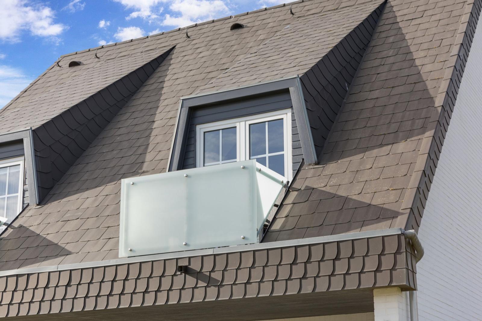 Skylight with glass balcony and sliding roof on gray roof