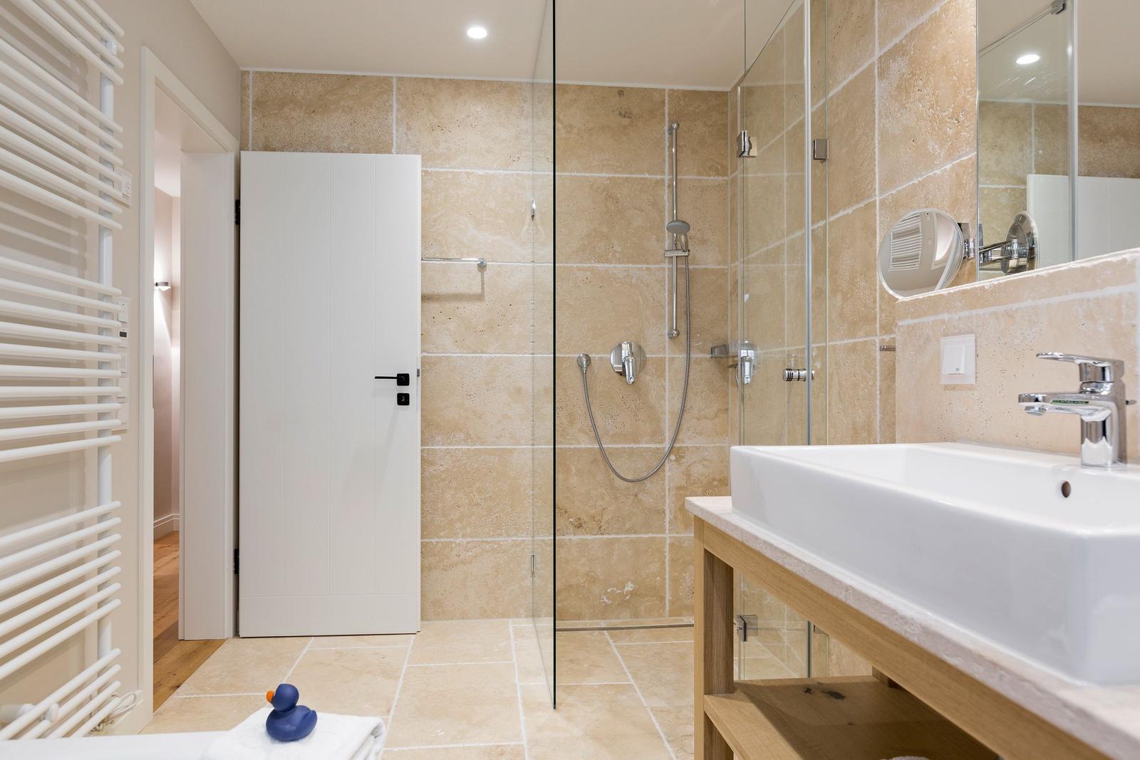 Bath with shower, sink, and heater