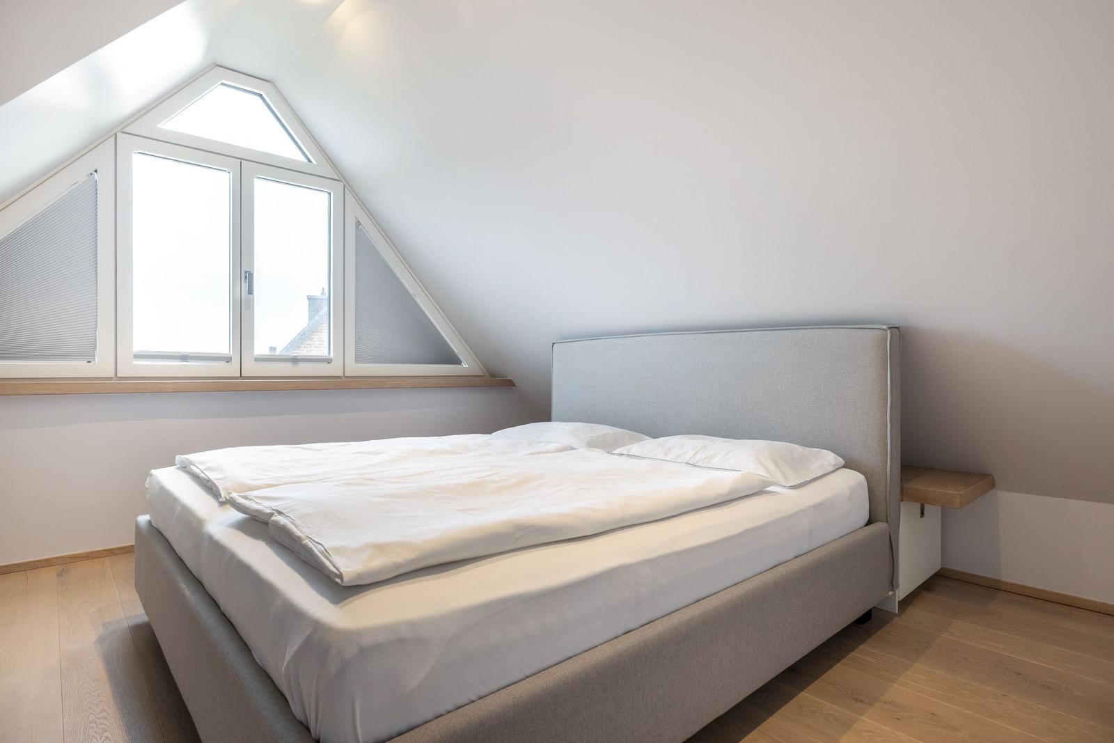 Bedroom with double bed and skylight
