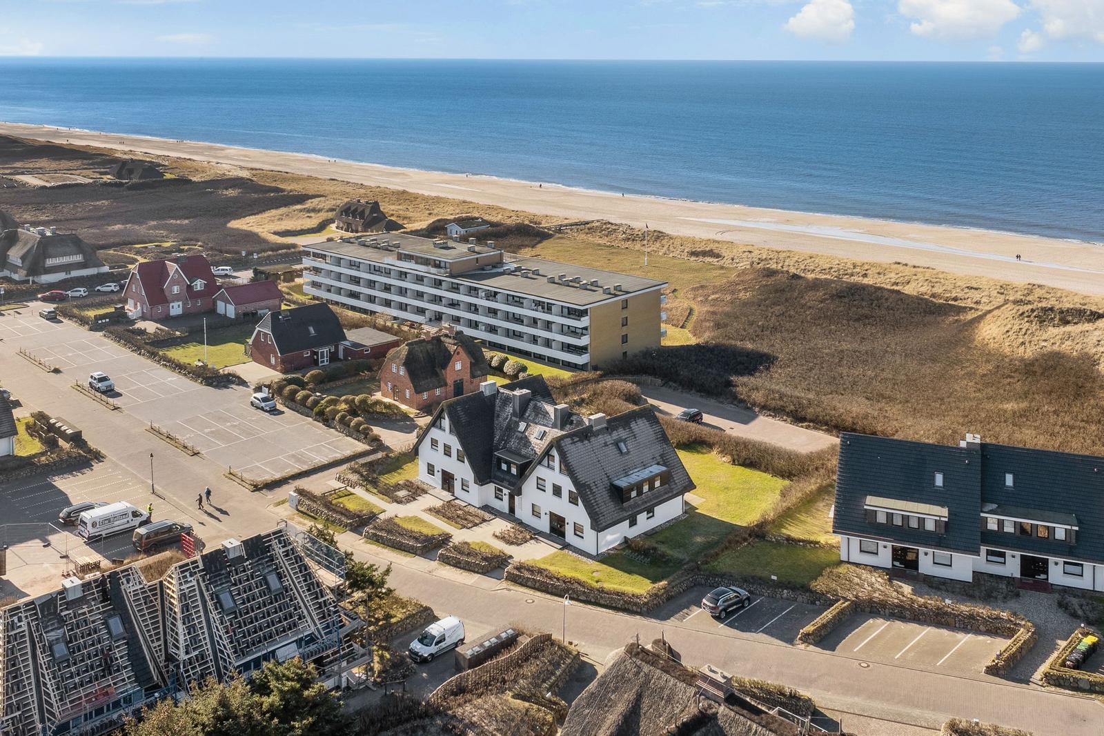 Holiday apartments near the beach with sea and dunes view.