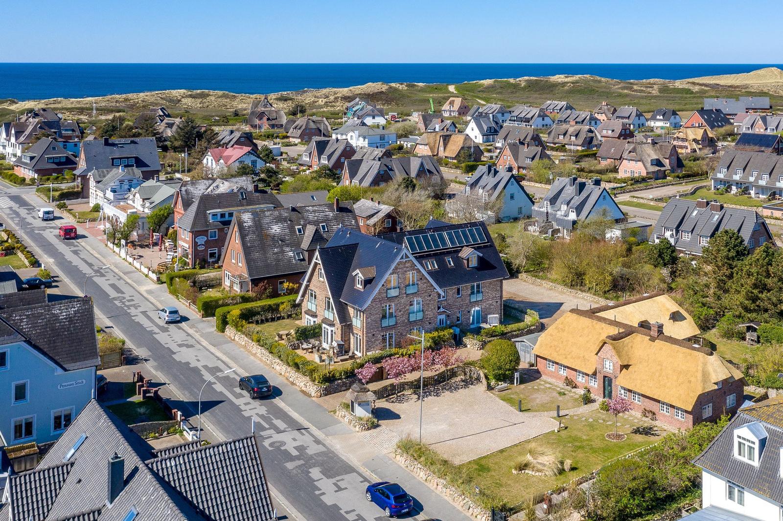 Village with houses and view of the sea