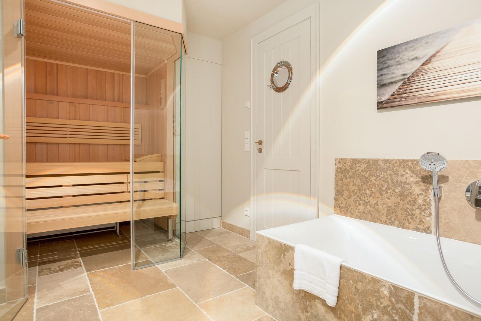 Shower with bathtub and sauna in the bathroom.