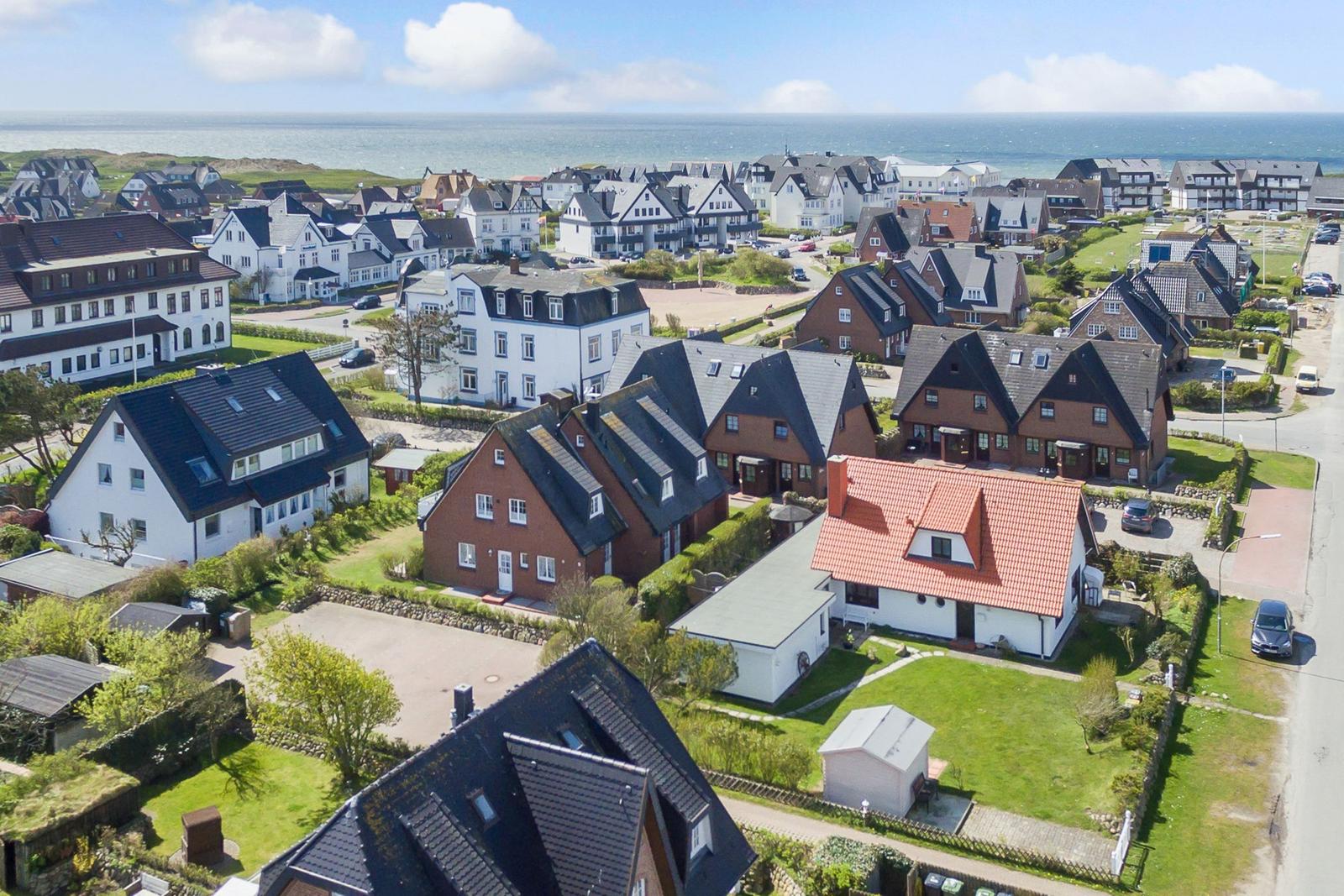 Village with houses and view of the sea