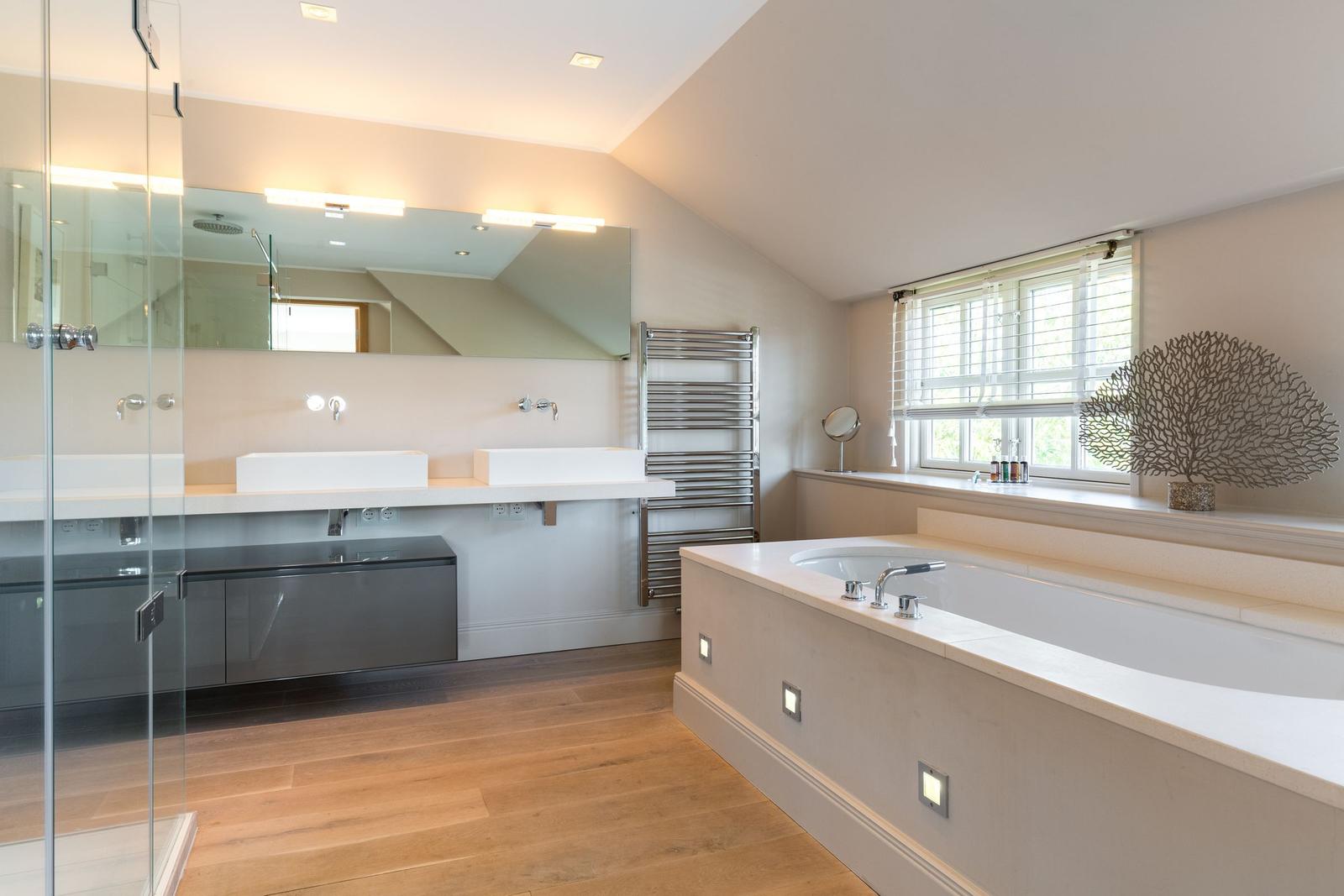 Bathroom with shower, bathtub, and sink