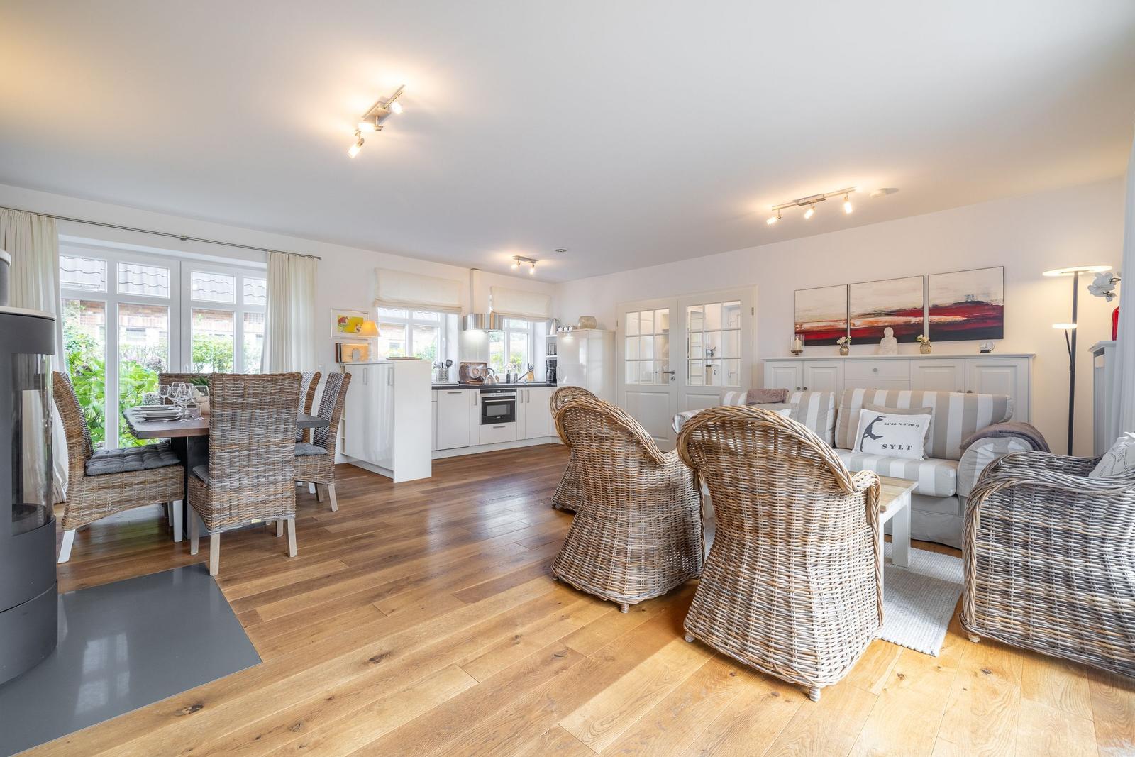 Living and dining area with kitchen and seating