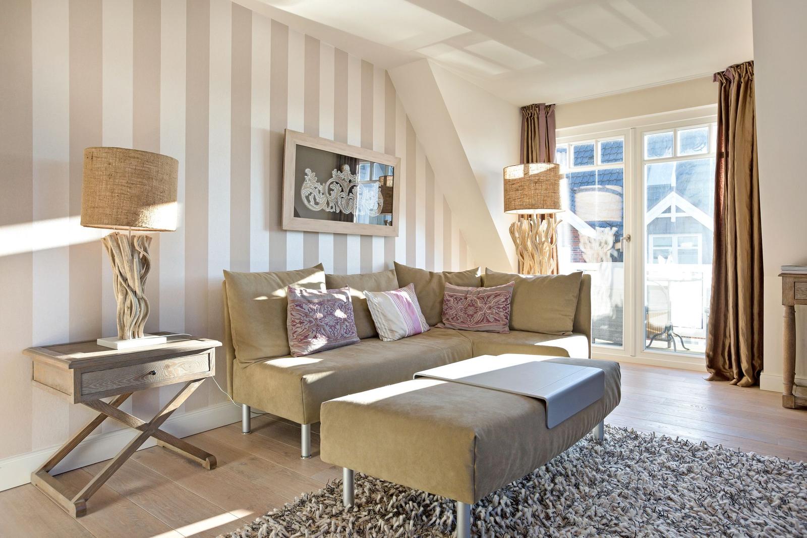 Living room with sofa, side table, and window with view.