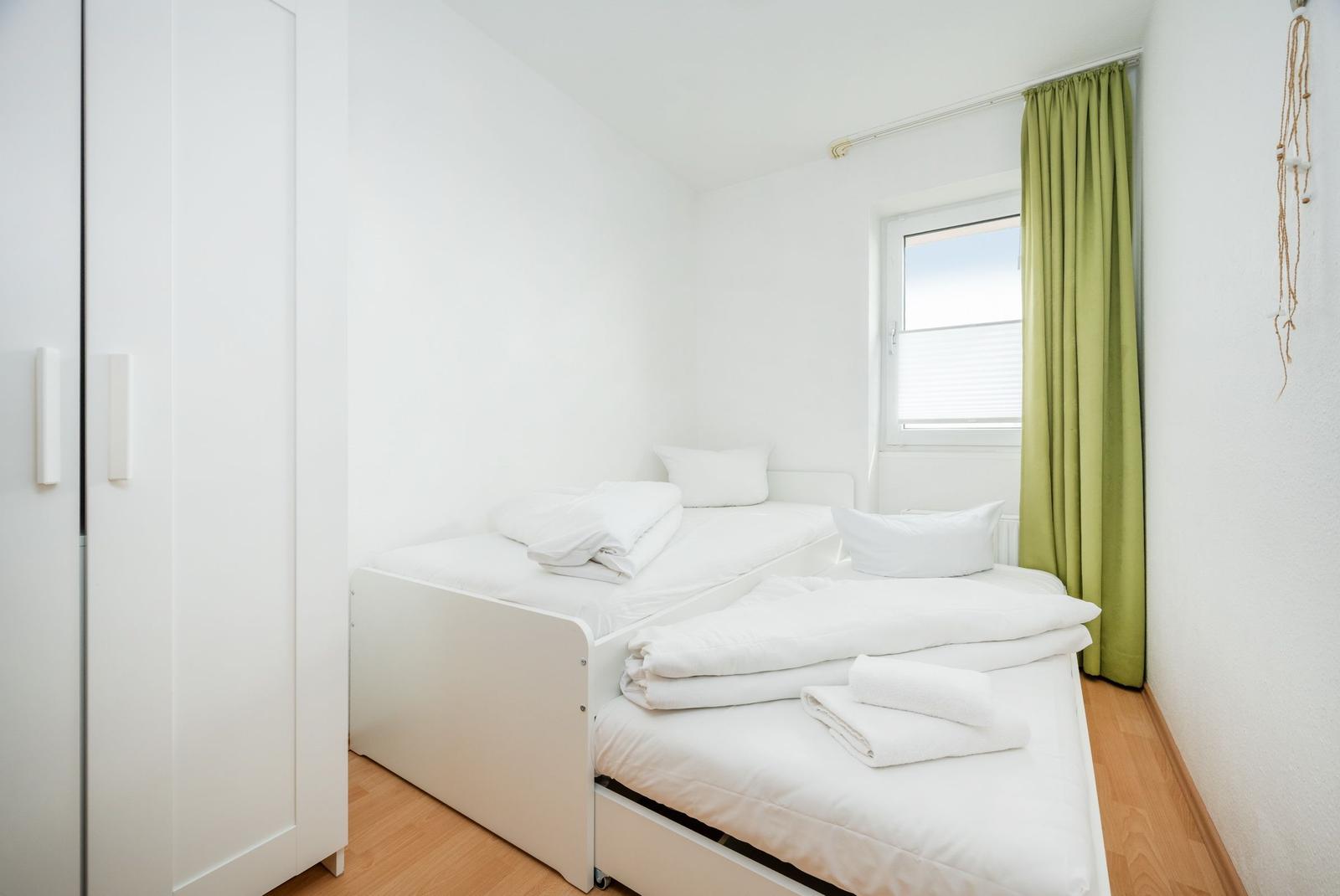 Schlafzimmer mit Einzel-/Doppelbett