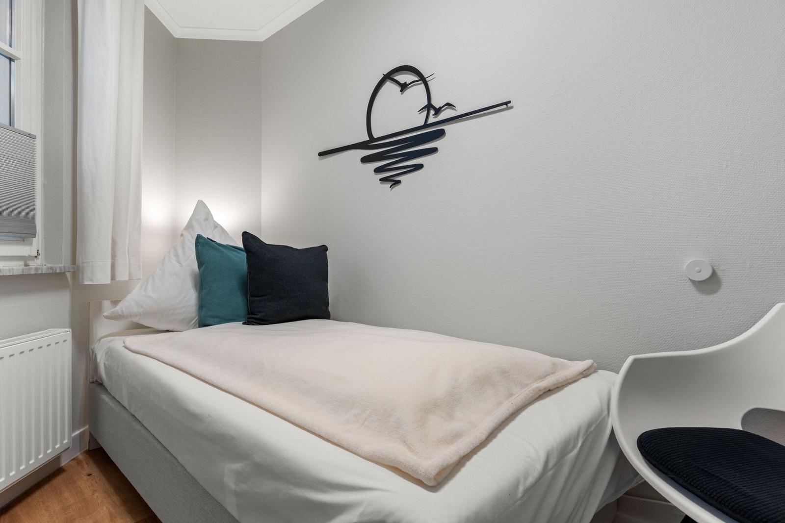 Zweites Schlafzimmer mit Einzelbett