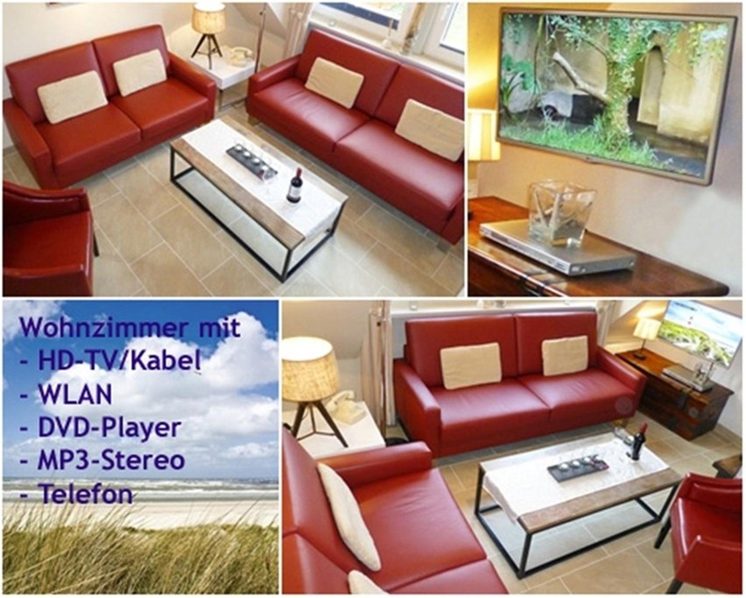 Wohnzimmer mit rotem Sofa, Fernseher und DVD-Player.