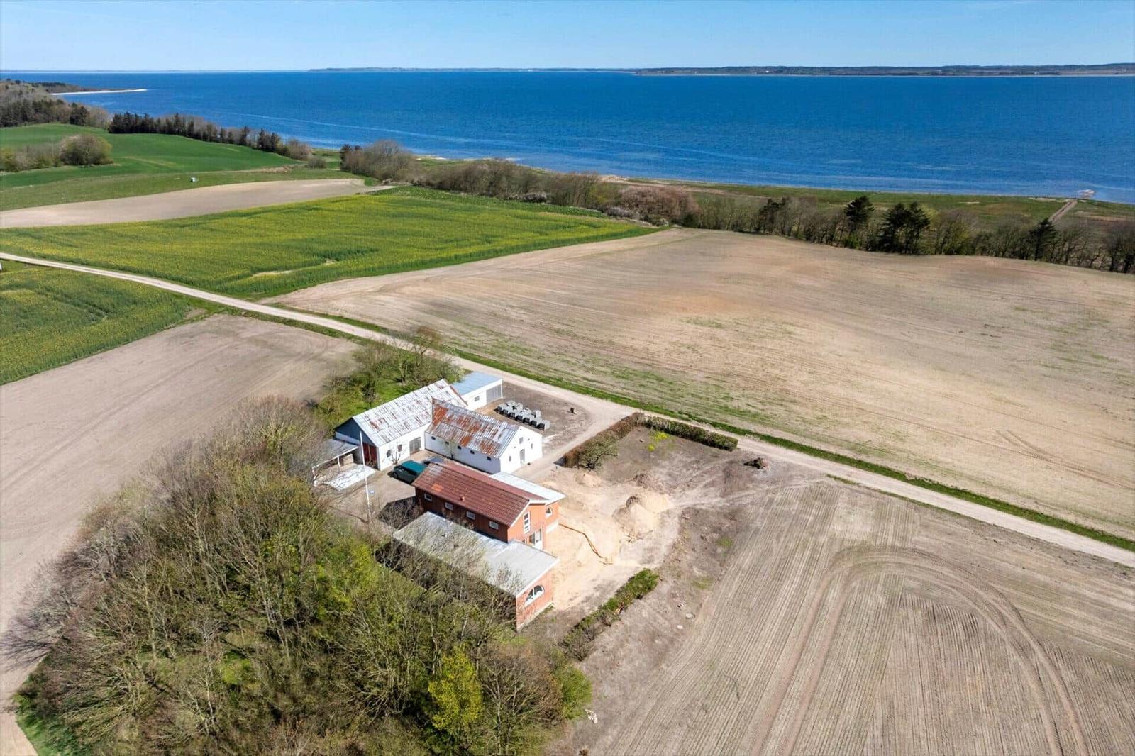 House with garden and view of sea and fields