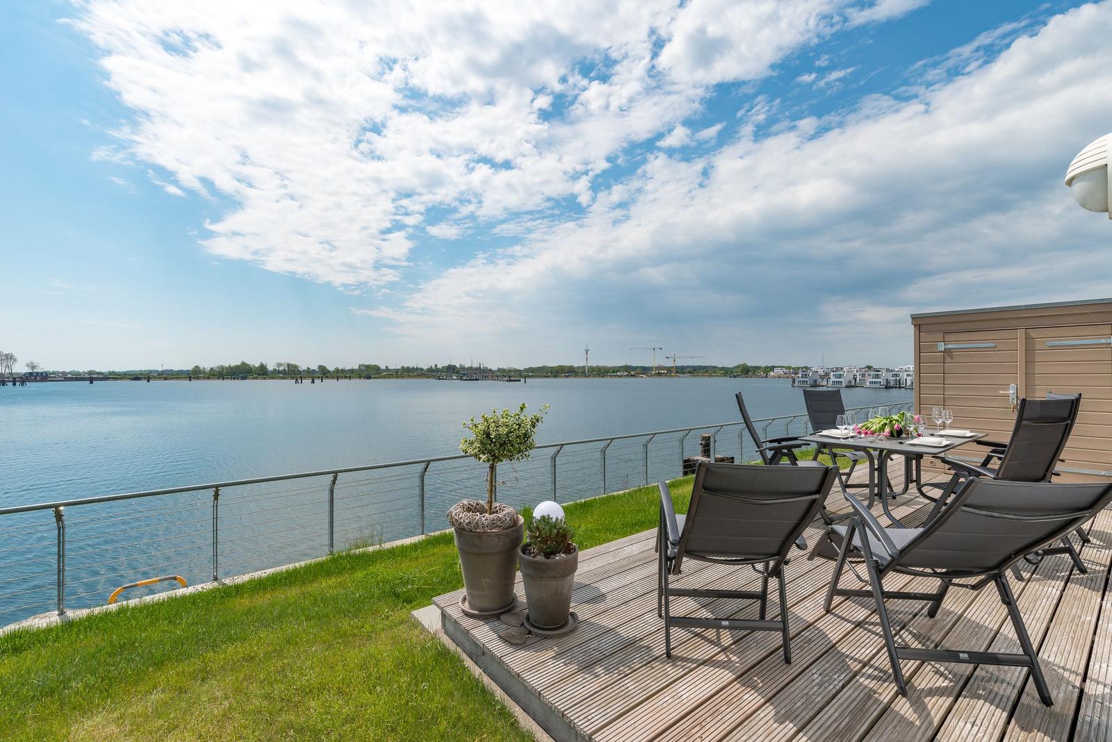 Terrace with seating and view of the harbor
