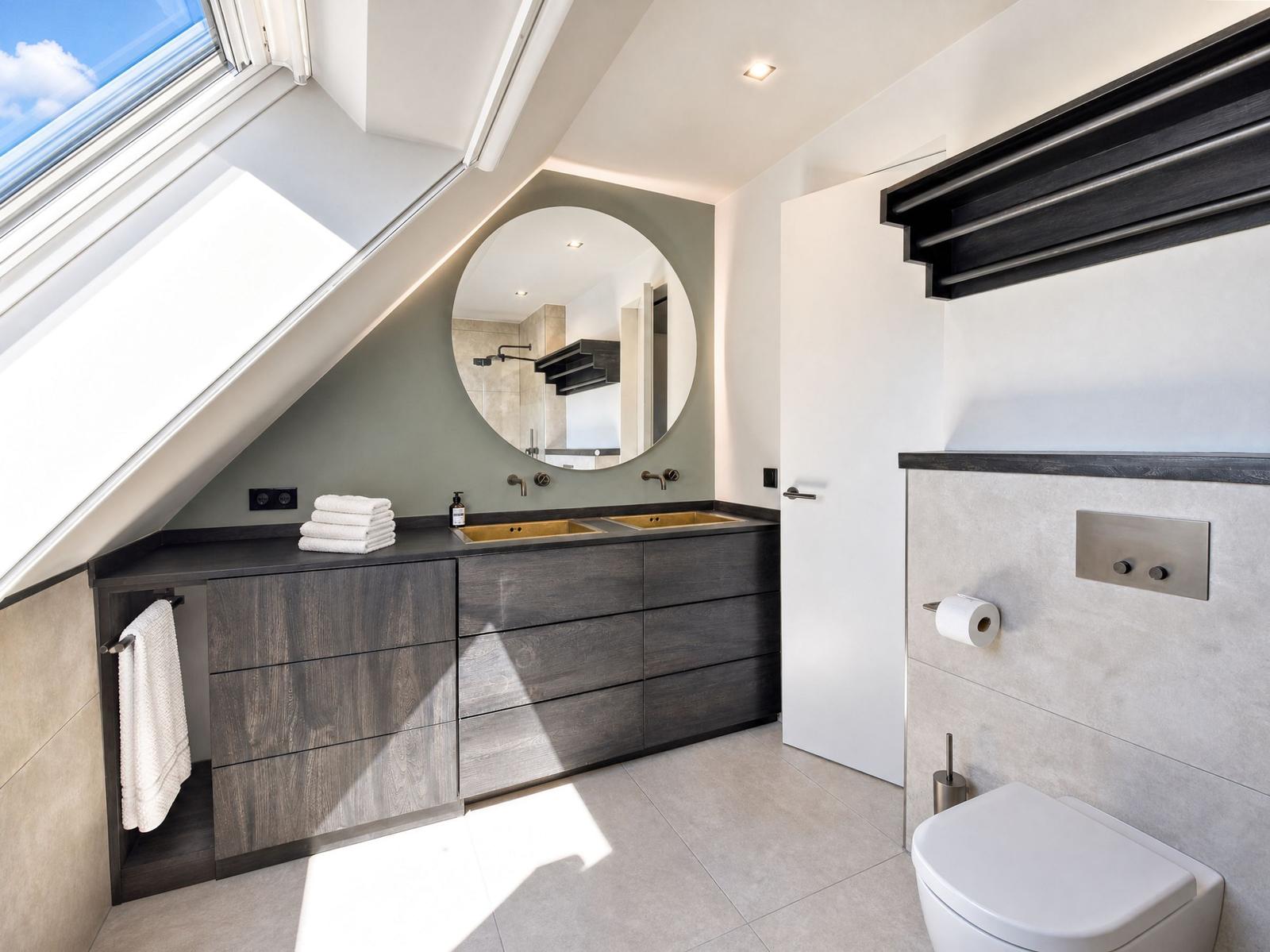 Shower with dual sinks and skylight. Modern bathroom fixtures.